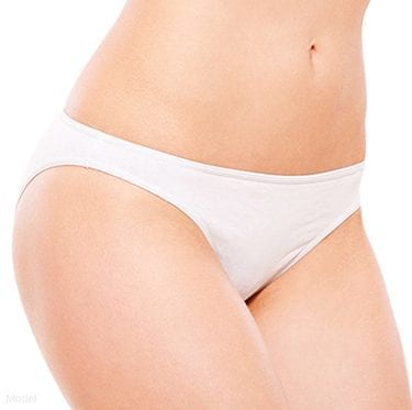 lower body of a female model in white underwear