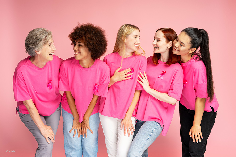 A group of women promoting breast cancer awareness
